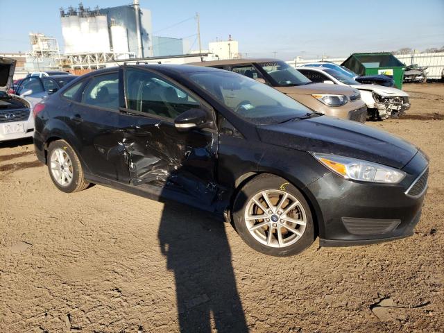 1FADP3F2XFL218418 - 2015 FORD FOCUS SE BLACK photo 4