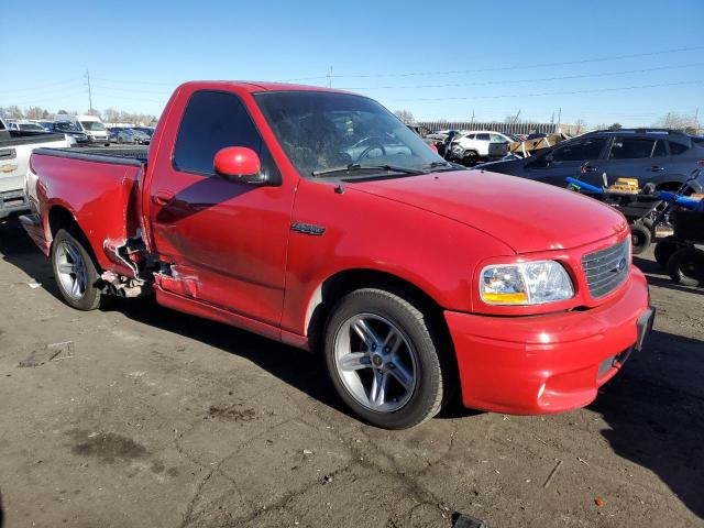 2FTRF07383CA44637 - 2003 FORD F150 SVT LIGHTNING RED photo 4