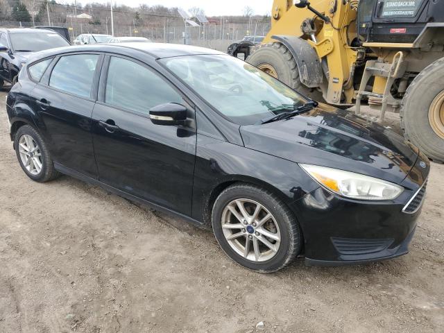 1FADP3K21GL259608 - 2016 FORD FOCUS SE BLACK photo 4