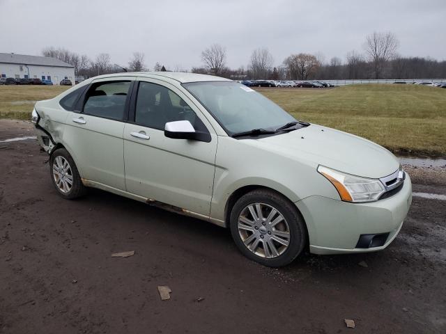 1FAHP3HNXAW170323 - 2010 FORD FOCUS SEL GREEN photo 4