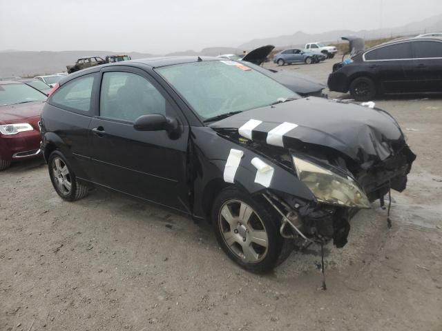 1FAHP31N27W139831 - 2007 FORD FOCUS ZX3 BLACK photo 4