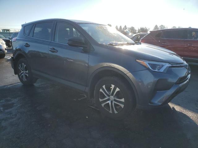 JTMBFREV3JJ260274 - 2018 TOYOTA RAV4 LE GRAY photo 4