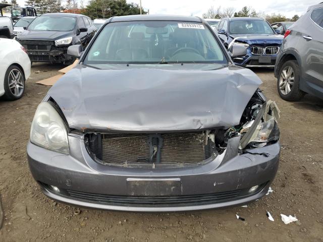 KNAGE124X75143943 - 2007 KIA OPTIMA LX GRAY photo 5