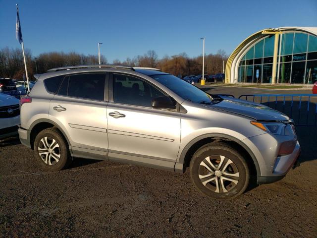 2T3ZFREV4GW284303 - 2016 TOYOTA RAV4 LE GRAY photo 4