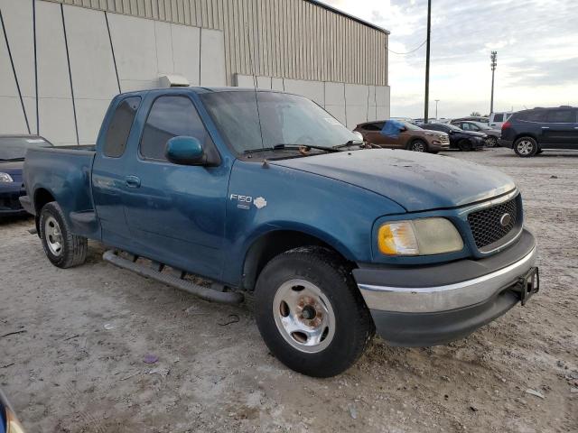 1FTRX07L6YKB44817 - 2000 FORD F150 TEAL photo 4