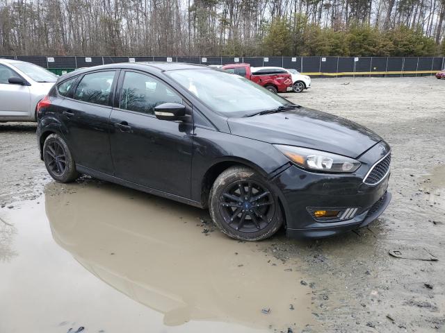 1FADP3K25FL205047 - 2015 FORD FOCUS SE BLACK photo 4