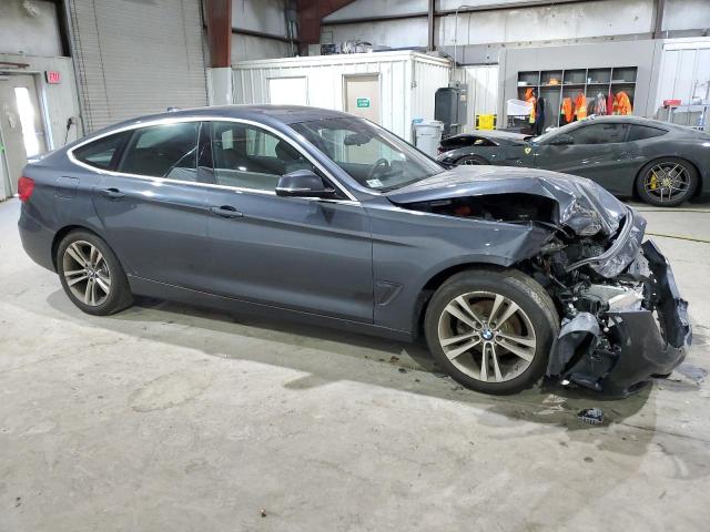 WBA8Z9C52JB220330 - 2018 BMW 330 XIGT CHARCOAL photo 4