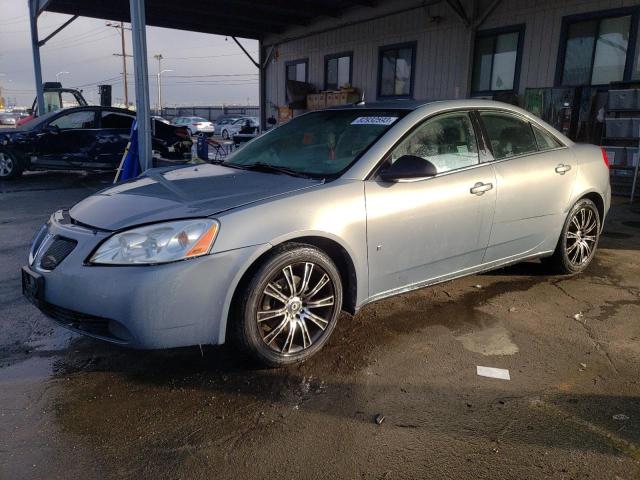 1G2ZG57B684234899 - 2008 PONTIAC G6 BASE BLUE photo 1