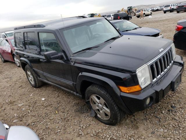 1J8HG48P97C592507 - 2007 JEEP COMMANDER BLACK photo 4