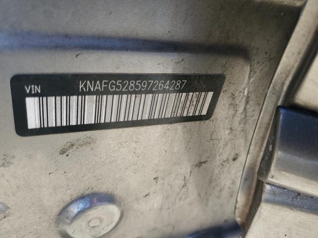 KNAFG528597264287 - 2009 KIA RONDO BASE SILVER photo 12