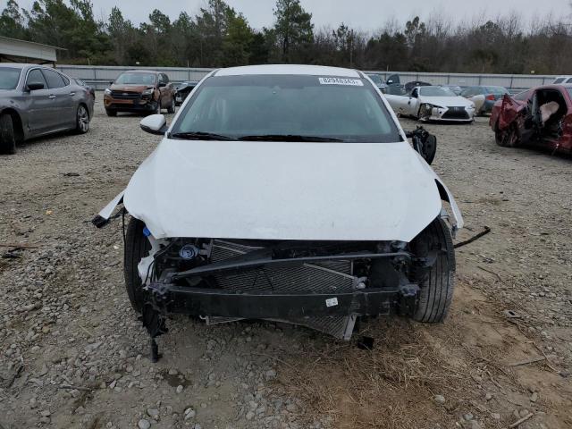 3KPF24AD8PE613451 - 2023 KIA FORTE LX WHITE photo 5