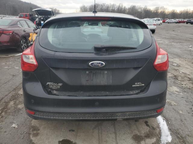 1FAHP3M23CL384649 - 2012 FORD FOCUS SEL BLACK photo 6