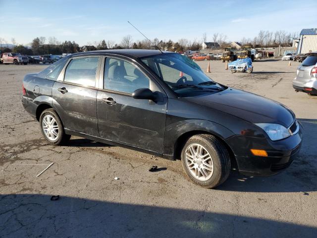 1FAHP34N47W356227 - 2007 FORD FOCUS ZX4 BLACK photo 4