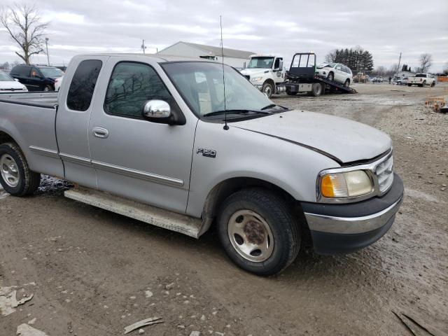 1FTZX1725XNA07829 - 1999 FORD F150 GRAY photo 4