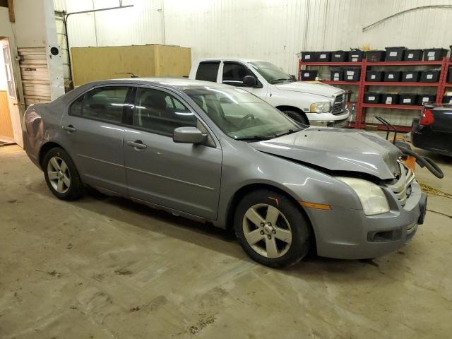 3FAHP07Z17R239317 - 2007 FORD FUSION SE GRAY photo 4