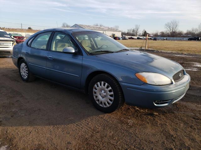 1FAFP56U97A205209 - 2007 FORD TAURUS SEL BLUE photo 4