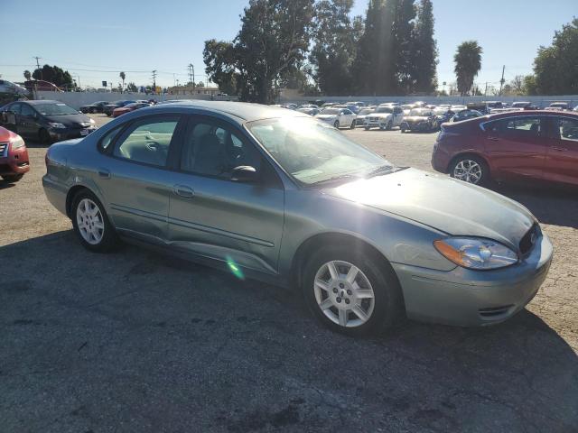 1FAFP53U85A207048 - 2005 FORD TAURUS SE GREEN photo 4