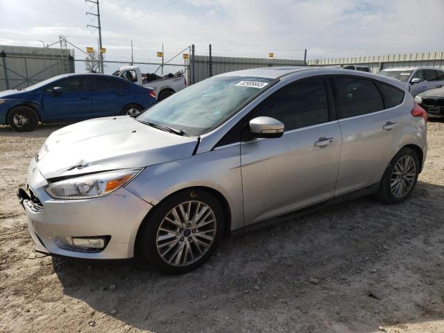 1FADP3N27FL340607 - 2015 FORD FOCUS TITANIUM SILVER photo 1