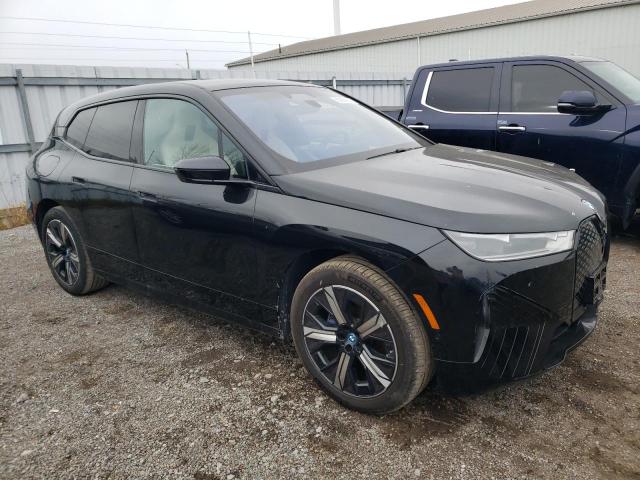 WB523CF05RCM99765 - 2024 BMW IX XDRIVE50 BLACK photo 4