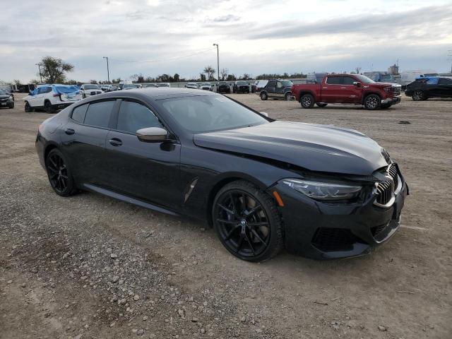 WBAGV8C07MCF06391 - 2021 BMW M850XI BLACK photo 4