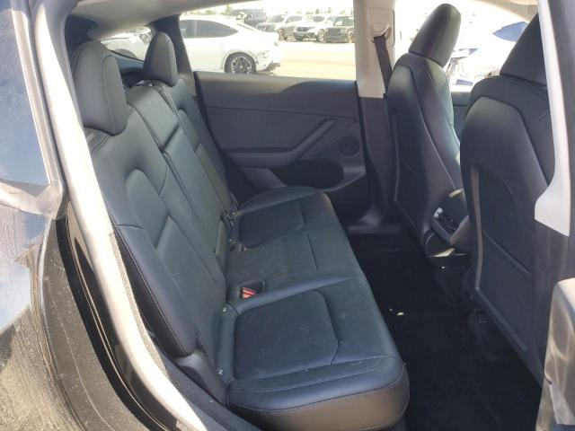 7SAYGDEE4PF907889 - 2023 TESLA MODEL Y Schwarz Foto 10