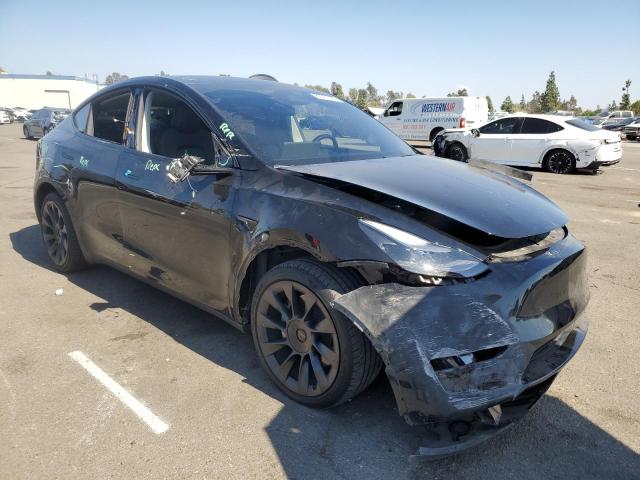 7SAYGDEE4PF907889 - 2023 TESLA MODEL Y Schwarz Foto 4