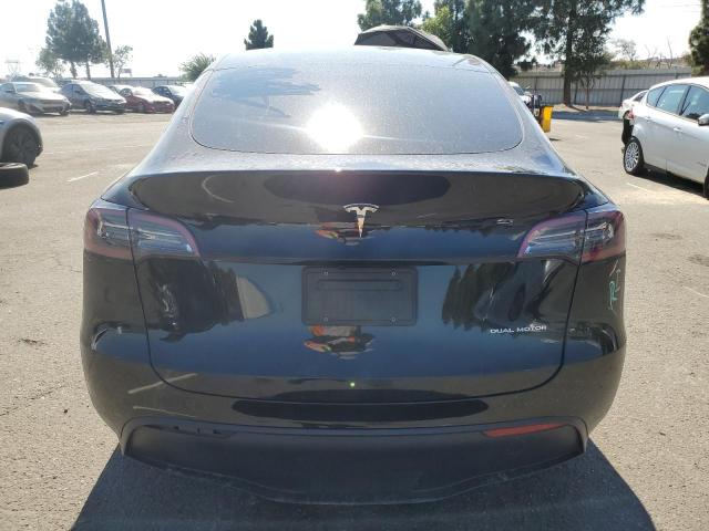 7SAYGDEE4PF907889 - 2023 TESLA MODEL Y Schwarz Foto 6