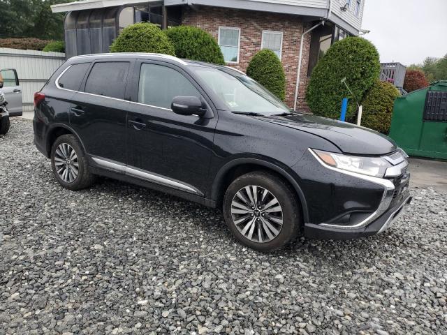 JA4AZ3A34LJ001181 - 2020 MITSUBISHI OUTLANDER SE BLACK photo 4