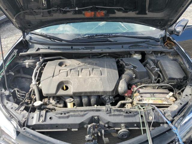 5YFBURHEXKP940168 - 2019 TOYOTA COROLLA L შავი ფოტო 11