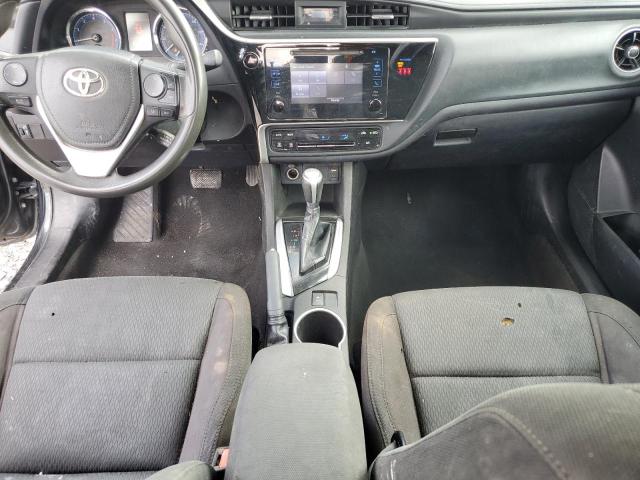 5YFBURHEXKP940168 - 2019 TOYOTA COROLLA L შავი ფოტო 8