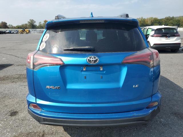 JTMZFREV7JJ740445 - 2018 TOYOTA RAV4 LE ლურჯი ფოტო 6