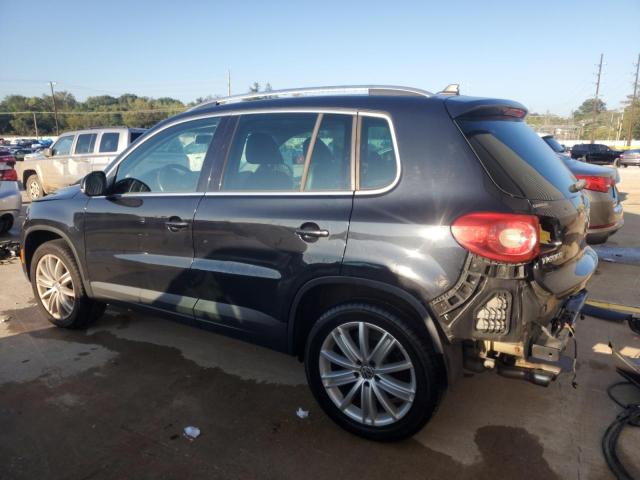 WVGBV7AX7AW510192 - 2010 VOLKSWAGEN TIGUAN SE BLACK photo 2
