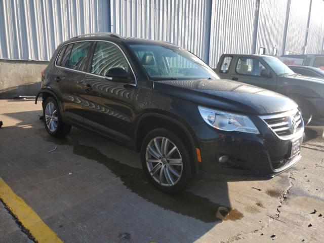 WVGBV7AX7AW510192 - 2010 VOLKSWAGEN TIGUAN SE BLACK photo 4