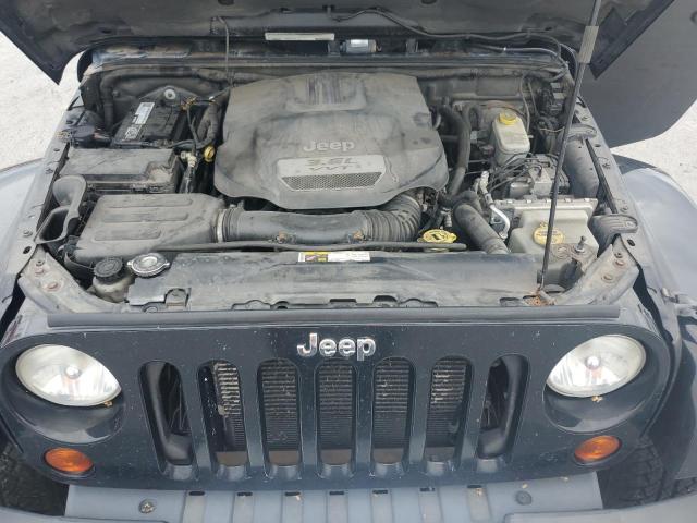 1C4BJWEG1CL179988 - 2012 JEEP WRANGLER U SAHARA შავი ფოტო 12