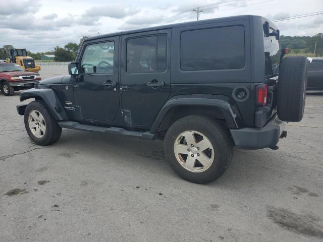 1C4BJWEG1CL179988 - 2012 JEEP WRANGLER U SAHARA შავი ფოტო 2
