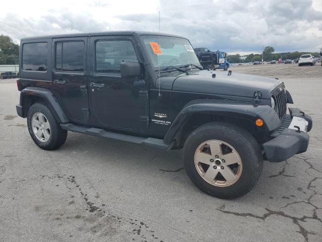 1C4BJWEG1CL179988 - 2012 JEEP WRANGLER U SAHARA შავი ფოტო 4