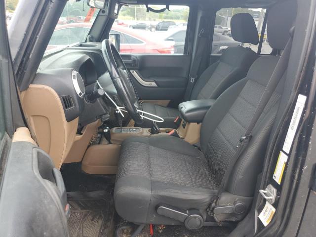 1C4BJWEG1CL179988 - 2012 JEEP WRANGLER U SAHARA შავი ფოტო 7