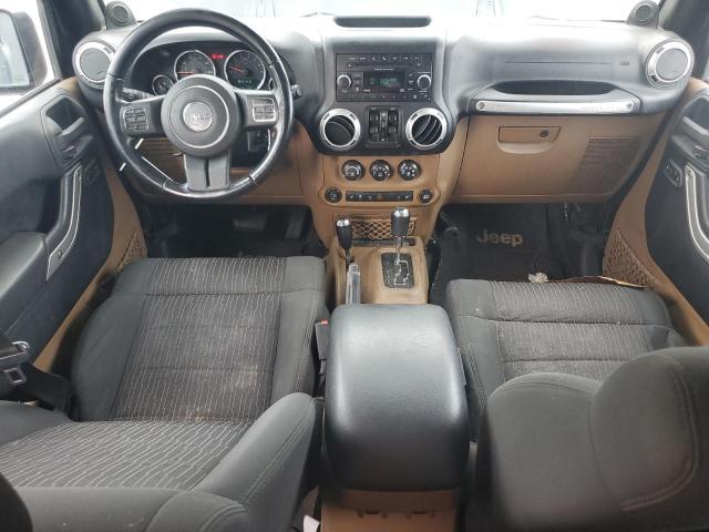 1C4BJWEG1CL179988 - 2012 JEEP WRANGLER U SAHARA შავი ფოტო 8