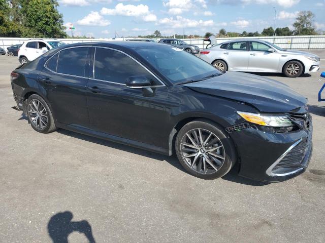 4T1F11AK3MU601314 - 2021 TOYOTA CAMRY XLE 黑色 照片 4