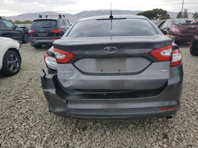 1FA6P0H7XG5115487 - 2016 FORD FUSION SE Մոխրագույն լուսանկար 6