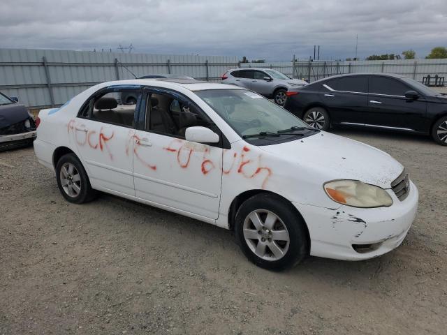 1NXBR38E53Z164658 - 2003 TOYOTA COROLLA CE WHITE photo 4