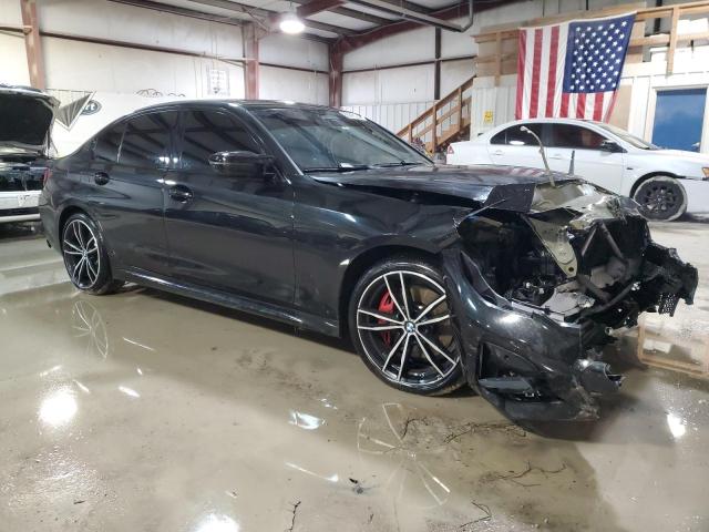 3MW5U9J08N8C24995 - 2022 BMW M340XI BLACK photo 4