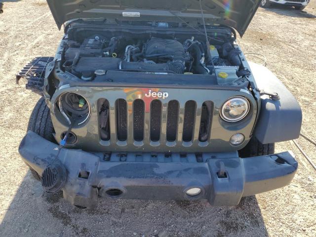 1C4BJWDG8FL599771 - 2015 JEEP WRANGLER U SPORT GREEN photo 11