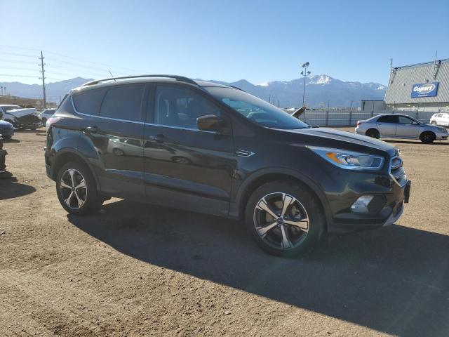 1FMCU9HD9JUB66665 - 2018 FORD ESCAPE SEL Schwarz Foto 4