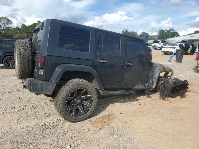 1J4BA5H16AL220656 - 2010 JEEP WRANGLER UNLIMITED SAHARA Qara foto 3