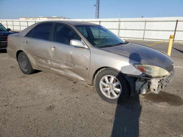JTDBE32K140255496 - 2004 TOYOTA CAMRY LE Braun Foto 4