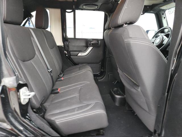 1C4BJWEG6DL599814 - 2013 JEEP WRANGLER U SAHARA أسود صورة 11