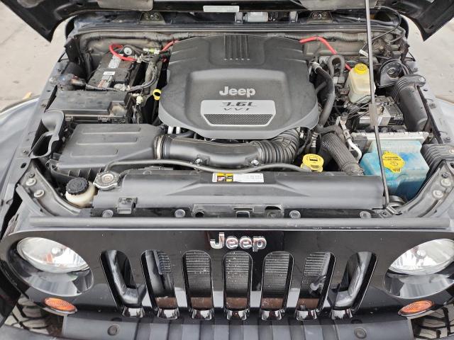 1C4BJWEG6DL599814 - 2013 JEEP WRANGLER U SAHARA أسود صورة 12