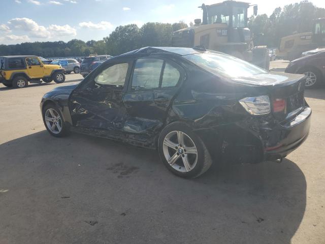 WBA3C3G52ENS71544 - 2014 BMW 320 I XDRIVE Schwarz Foto 2