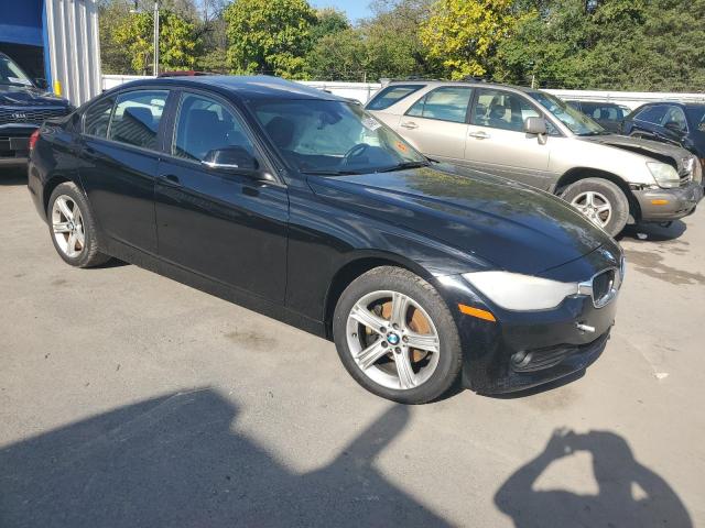 WBA3C3G52ENS71544 - 2014 BMW 320 I XDRIVE Schwarz Foto 4